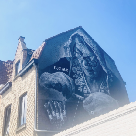 Muurschildering van kantklosser