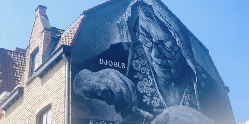 Muurschildering van kantklosser